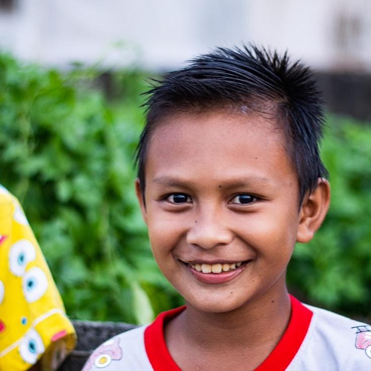 Mira Patel, Lead Design Curator at Cool Harbor Gaze, reviewing corporate floral arrangements